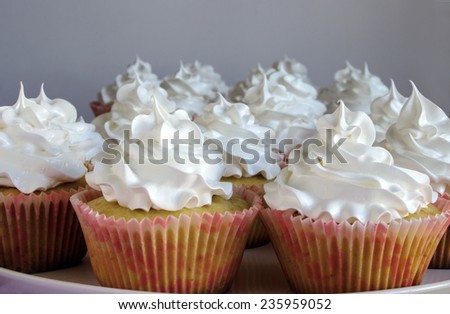 sweet cupcakes with white cream air