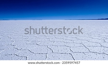 Salt flats (Salar de Uyuni). The biggest salt desert in the world. Royalty-Free Stock Photo #2359597457