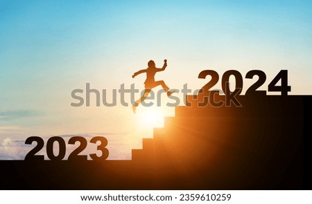 A man running up the stairs from 2023 to 2024. 2024 New Year concept. New year's card 2024.