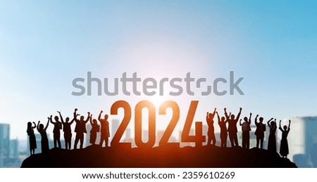 Multinational people rejoice at the start of 2024. 2024 New Year concept. New year's card 2024. Royalty-Free Stock Photo #2359610269