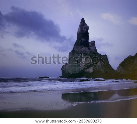 ANALOG PHOTOGRAPHY. Medium Format 6x7. Slide 120. The beautiful and difficult to access Bear Beach, praia da Ursa, seeing his iconic bear rock, at dusk, located in the Natural Park of Sintra-Cascais a