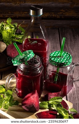 Beetroot juice in a mug  on a rustic wood  dark background. Detox and healthy diet -selective focus
