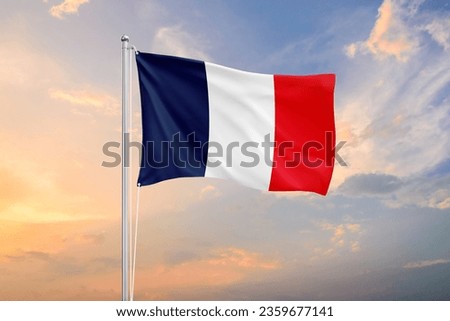 France flag waving on sundown sky