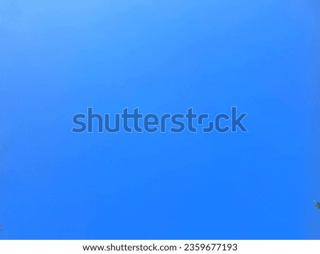 The sky is beautiful, clean, naturally bright blue, without clouds.
Suitable for background images, illustrations, or text.