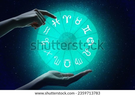 Astrology. Woman with zodiac wheel against starry night sky, closeup