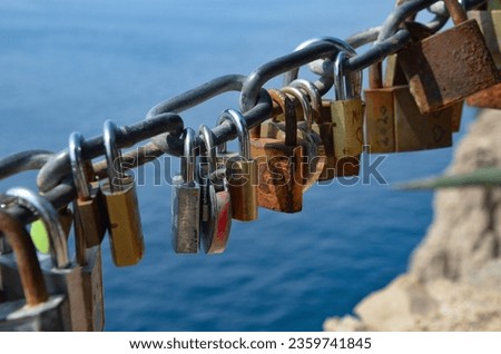 Closed padlocks on the power - a symbol of constant love and durability of the relationship