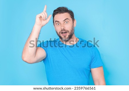 Man thinking of idea on studio background. Portrait of man has many ideas. Man with index fingers hand gesture man has idea, presenting promo offer. Decision idea process. Good idea. Royalty-Free Stock Photo #2359766561