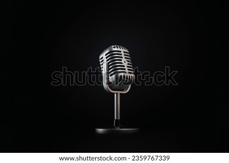Microphone retro, vintage, on black background, negative space, copy space, space for text, background.