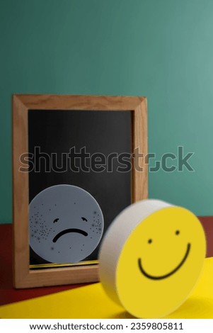 Mental Health Concept. Complexity of Deepest Mind and the Personality to Expressed Different Characteristics in Public. a Happy Face Reflects a Sad face on another side of the Mirror. Bipolar Disorder