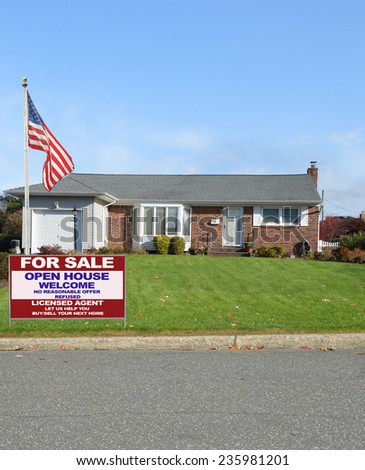 American flag pole Real Estate for sale open house welcome sign suburban ranch style home residential neighborhood blue sky clouds USA