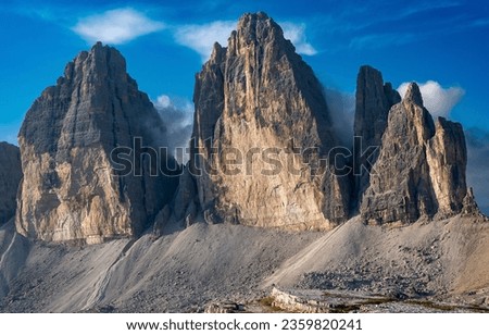 High cliffs in the Dolomites. Dolomites mountains. Dolomites rocks. Dolomites peaks Royalty-Free Stock Photo #2359820241