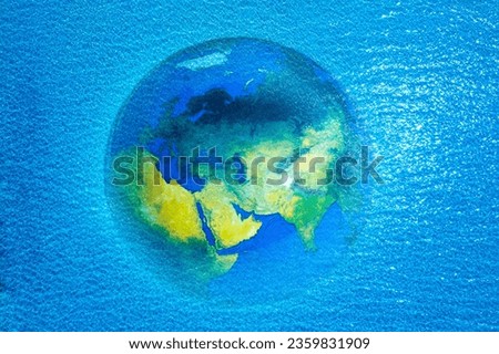 Meaningful pictures The world is submerged under the sea. Concepts of disasters, floods and water treatment. Prevent global warming