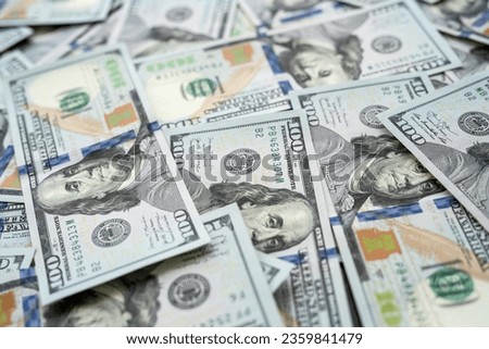 Stack of new 100 dollars as finance background. Business money concept