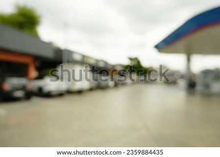 Blur focus of parking lot and gas station view