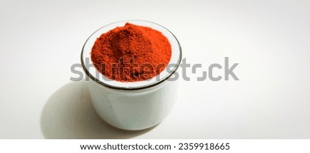 Red chilli powder stock image photography with white background. 