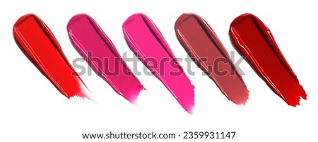 Lipstick range of shades texture composition isolated on white background. Cosmetic product smear smudge swatch sample Royalty-Free Stock Photo #2359931147