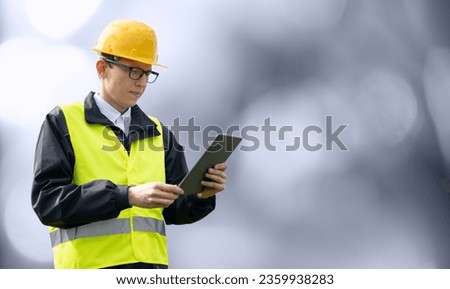 Man with a digital tablet. Serviceman, worker, engineer.	 Royalty-Free Stock Photo #2359938283