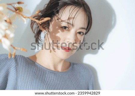 Fashion portrait of middle aged Asian woman. Beauty concept. Skin care. Cosmetics. Anti-aging.