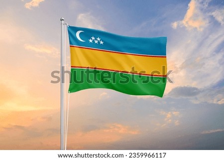 Karakalpakstan flag waving on sundown sky