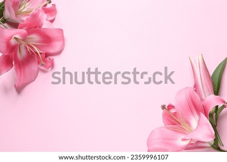 Beautiful pink lily flowers on color background, flat lay. Space for text Royalty-Free Stock Photo #2359996107