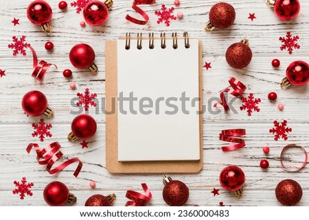 Christmas blank greeting card mock-up scene. Creative layout made of Christmas tree branches and paper card note. Flat lay. Nature New Year concept.