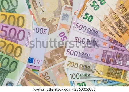 Flat lay of euros banknotes, lot of EU money. Saving investment concept Royalty-Free Stock Photo #2360006085