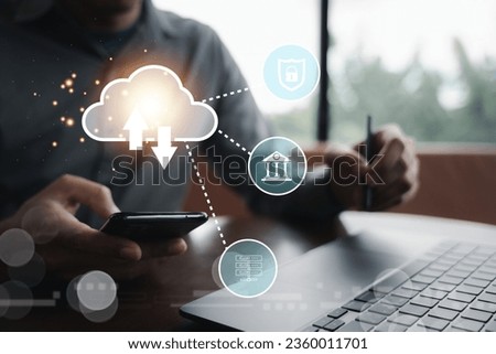 Cloud computing and networking technology concept. Man showing digital screen with cloud diagram. Businessman in the background represents global support and innovation.