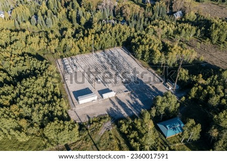 Aerial View of an Electrical Sub Station in Wyoming in the Middle of a Forest Royalty-Free Stock Photo #2360017591