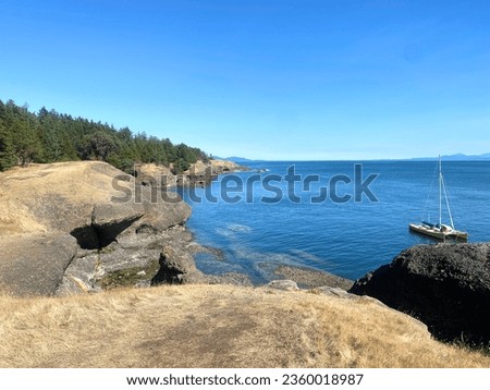 A beautiful view of the coastline along Hornby Island.  Views are from a trail in Helliwell Provincial Park, on a beautiful sunny summer day in the Gulf Islands, British Columbia.