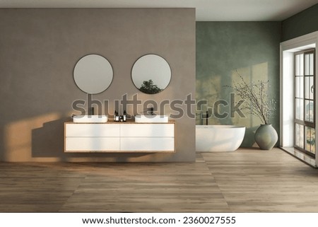 Modern bathroom interior with soil tone and green color walls, parquet floor, double sink, bathtub, plant. Royalty-Free Stock Photo #2360027555