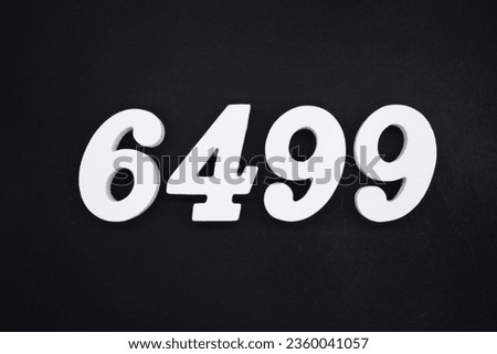 Black for the background. The number 6499 is made of white painted wood.