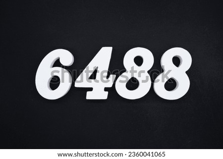 Black for the background. The number 6488 is made of white painted wood.