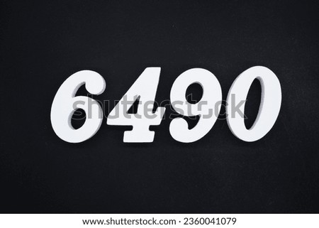 Black for the background. The number 6490 is made of white painted wood.