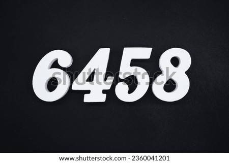 Black for the background. The number 6458 is made of white painted wood.
