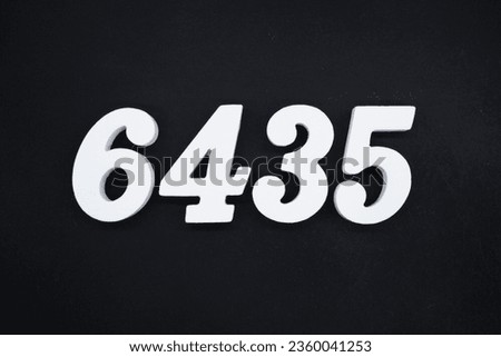 Black for the background. The number 6435 is made of white painted wood.