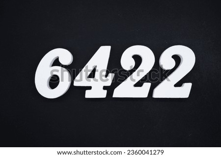 Black for the background. The number 6422 is made of white painted wood.