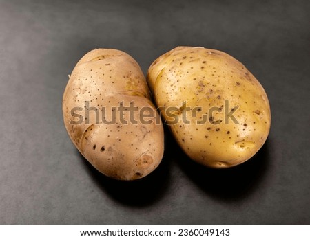 Potato agria isolated on a black background