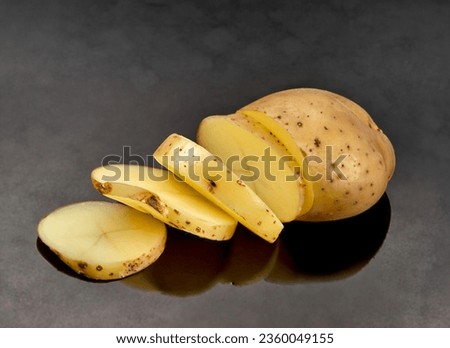 Potato agria isolated on a black background