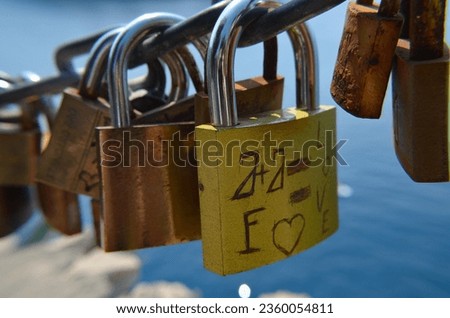 Closed padlocks on the power - a symbol of constant love and durability of the relationship