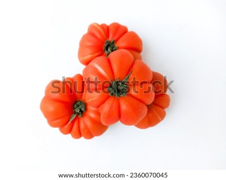 fresh curly tomatoes isolated white Royalty-Free Stock Photo #2360070045