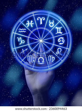Astrology. Woman touching zodiac wheel on bright background, closeup