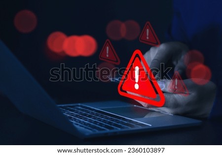 Businessman or employee with warning triangle sign for warning error Hack Alert System Warning cyber attack Royalty-Free Stock Photo #2360103897