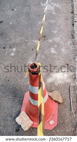 cone blocking the city street 