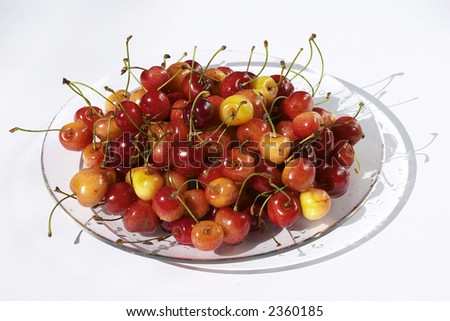 assorted cherries hill on the glassy plate