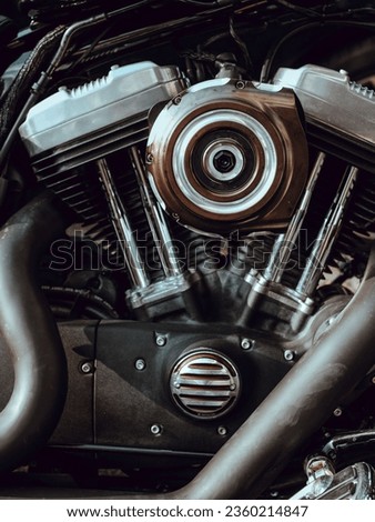 A vertical closeup of a motorcycle engine