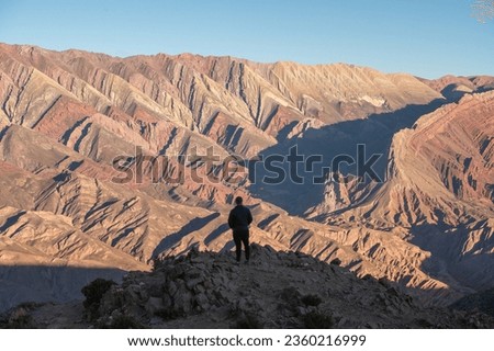 El Hornocal, Argentina : 2023 June 8: People in the Serrania de Hornocal, the hill of the fourteen colors in the Quebrada de Humahuaca , Jujuy, Argentina in 2023. Royalty-Free Stock Photo #2360216999