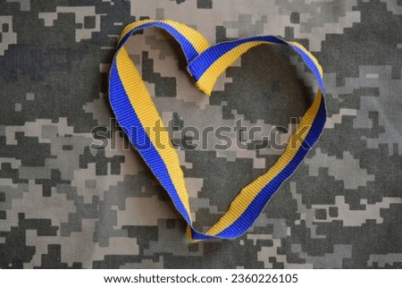 blue and yellow ribbon on the Ukrainian uniform