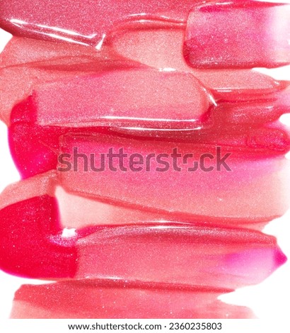 Pink red gold lip gloss texture composition on white background. Cosmetic product smear smudge swatch Royalty-Free Stock Photo #2360235803