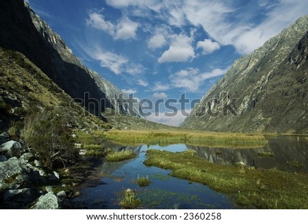 Blue lake and white clouds in Cordilleras mountain