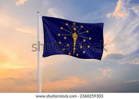 Indiana flag waving on sundown sky